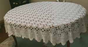 ecru coloured oval crocheted tablecloth/bedspread 220cm x 170cm