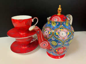 T2 Large tea pot and two cup and saucers