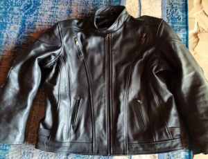 Large very heavy solid leather Motor Bike Jacket.