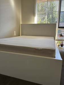 Ikea double size bed frame with mattress.