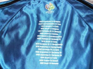 2006 FIFA WORLD CUP GERMANY COMMEMORATIVE "WORLD CHAMPIONS" TOP