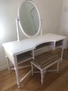 Dressing table with mirror, small side table and two matching stools.