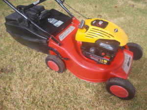 ROVER LAWN MOWER $ 130.