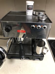 Espresso machine with steamer and grinder