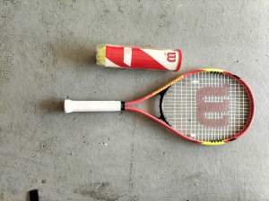 Wilson Tennis racquet with can of balls