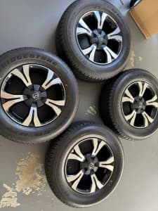 Set of brand new Mazda BT rims and Bridgestone tyres 265/60/18