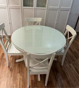 IKEA white round extendable table with 4 chairs and glass protector