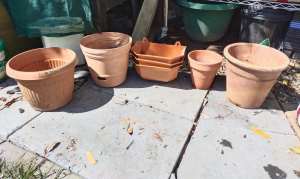 Terracotta and plastic lookalike pots 