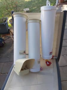 Chook feeder and waterers. Packaged as one feeder and two waterers.