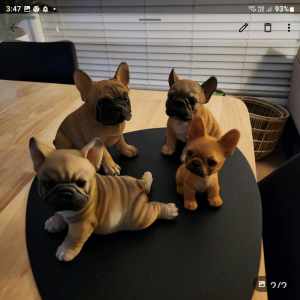 Frenchie statues