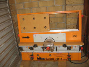 Triton 2000 router table, router and bits.