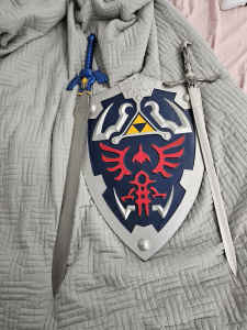 Zelda and assassins creed sword with shield