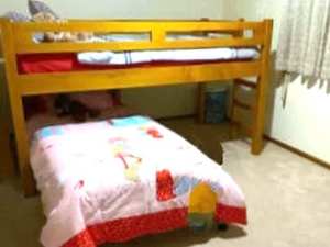 bunk bed with mattresses, top king single bottom single, great conditi