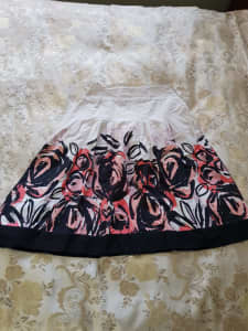 size 12 peach, black and white skirt