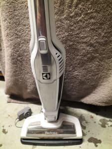 Stick vacuum with removable hand piece 