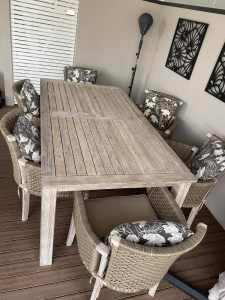 Solid timber outdoor table and 6 chairs including pillows