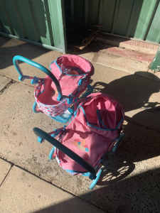 Kids baby born trolley and dolls x2