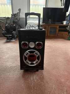 DJ speaker with party lights and microphone