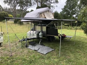 Camper Trailer with Roof Top Tent and Awning