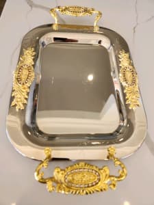 Serving tray chrome and gold plated. 