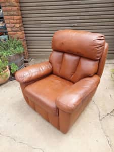 Comfortable classic tan leather lounge chair