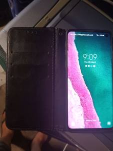 Mobile phone Samsung S10 and case read below