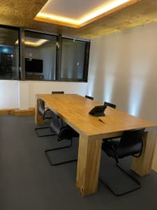 Large, custom designed boardroom or conference room table