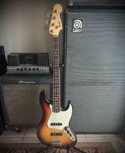 1963 Fender Jazz Bass in sunburst finish with brown tolex case
