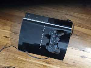 Playstation 3 good condition used half a dozen times one controller