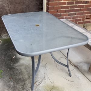 Outdoor glass top table