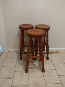 3 wooden bar stools 