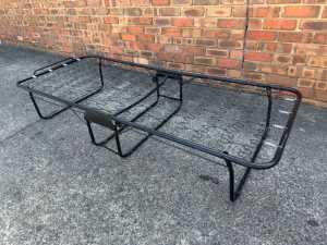 New folding single size bed frame with wheels