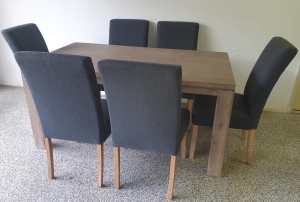 Immaculate Dining Table and 6 Chairs