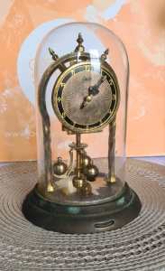 Vintage Schatz German brass finish anniversary clocks with glass domes