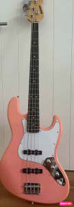 new pink bass guitar