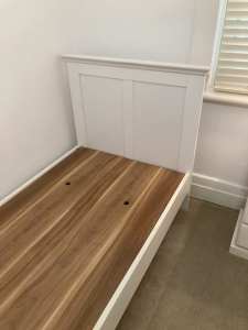 White timber single bed