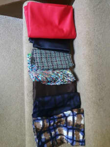 Assorted bag of dressmaking fabrics, various lengths.