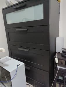 Tall boy black in colour 4 drawers (1 with glass panel)