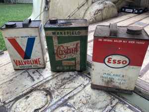 Old one gallon oil tins 