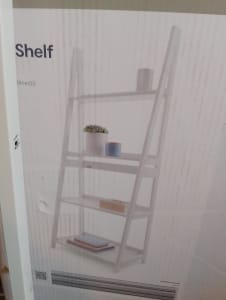 4 tier ladder white shelf needs to go ASAP 