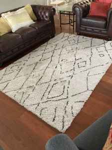White rug with black pattern