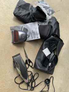 Remington hair clippers, battery and electric included, plus a cape