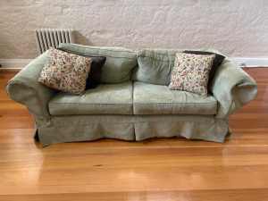 Pale green 2.5 seater couches x 2