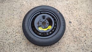 spare tyre, pcd is 5 x 108, tyre is as new pirelli 125/85/16,