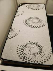Single mattress with protector