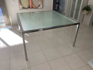 Used chrome finished glass top 8 seat dining table