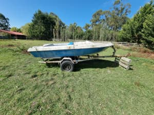 old boat and trailer , need gone asap