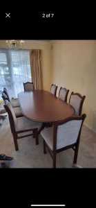 8 seater extendable table and 8 chairs