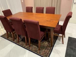 Wooden dining table and 8 chairs