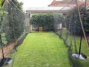 Cricket net with support poles